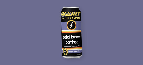 A can of Gigawatt Coffee Roasters cold brew coffee, medium roast with a light nitrogen infusion, on a purple background