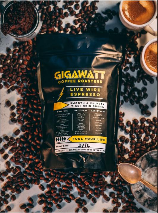 Espresso Blend Coffee laying on Coffee Beans.