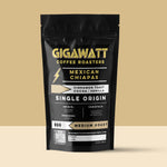 Gigawatt Coffee Mexican Chiapas Coffee, single origin medium roast with smooth cinnamon toast, vanilla, and cacao notes. 10 oz, set against a cloud-filled background.