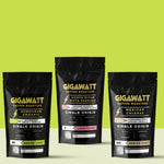 Gigawatt Coffee Single Origin Coffee Sampler, featuring bestselling Organic Honduran Coffee, Mexican Chiapas, and Costa Rican Tarrazu. A trio of single origin roasts with smooth, well-balanced flavor. 10 oz bags, displayed on a counter.