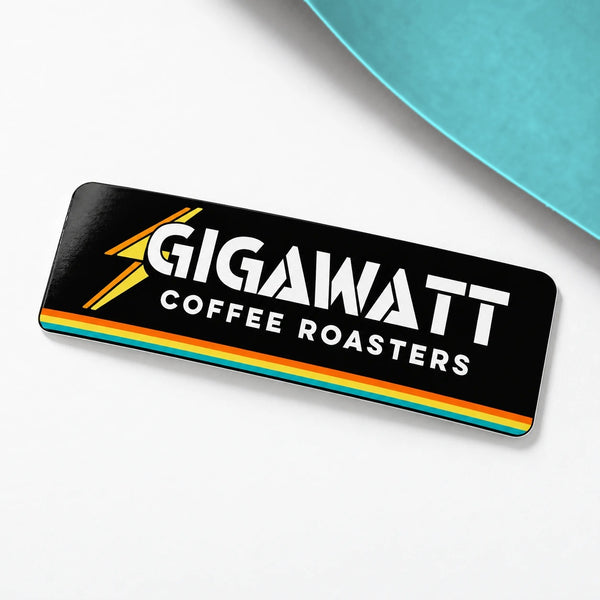 Gigawatt Coffee Roasters 3 by 1 inch mini rectangle sticker with the Gigawatt wordmark, gloss finish