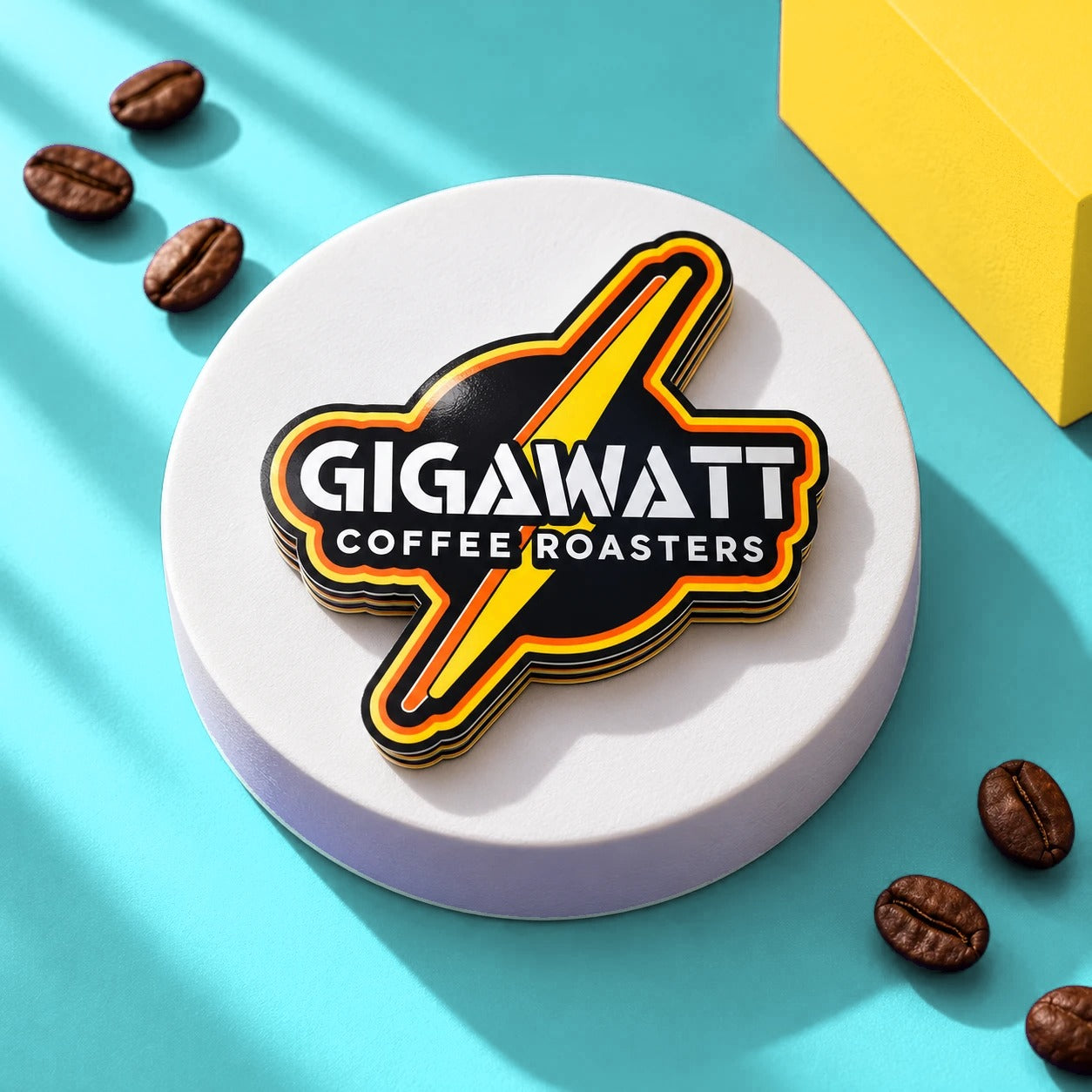 Stack of Gigawatt signature die-cut bolt stickers on a teal and yellow background with coffee beans